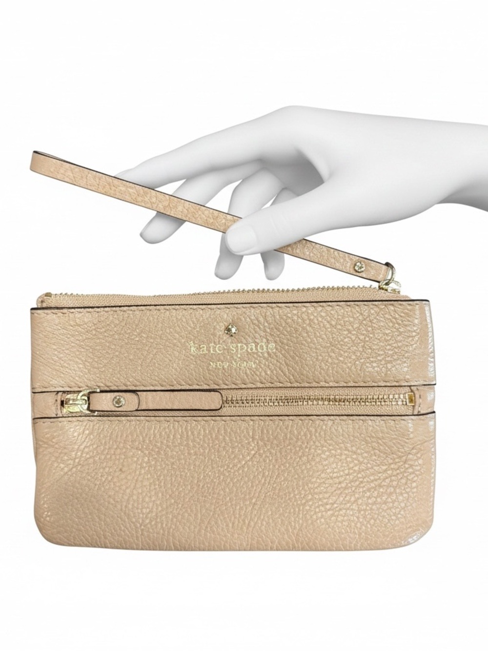 Kate Spade Beige Pebbled Leather Wristlet with Front zipper pocket.